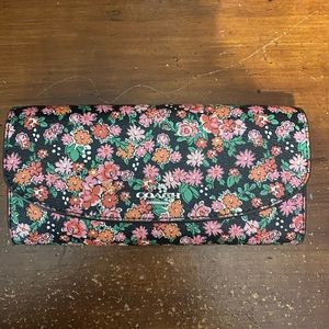 Coach women’s floral print envelope wallet